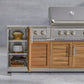 Outdoor kitchen cabinets and 304 stainless steel grill with open shelves for bowls and utensils, perfect for entertaining.