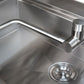 Modern stainless steel outdoor kitchen sink with sleek single-handle faucet, perfect for modular setups.