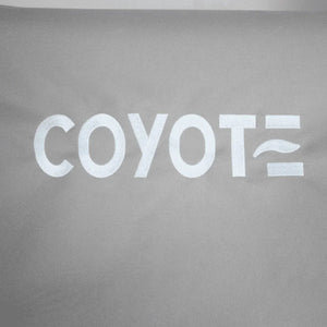 Light gray, weather-resistant grill cover with "Coyote" logo and wave design. Ideal for premium outdoor kitchens.