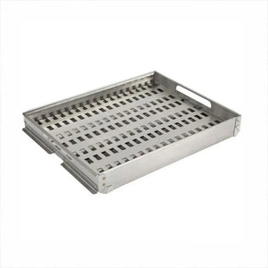 Coyote metal grill basket with slotted holes, ideal for charcoal grilling. Durable finish for outdoor kitchens.