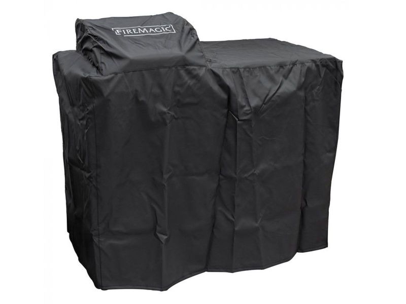 Fire Magic black grill cover shields your outdoor grill island, protecting premium finishes and components.