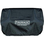Fire Magic grill cover with logo and "Savor The Moment," offering premium protection for your outdoor kitchen.