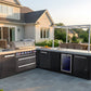 Premium outdoor kitchen with Mont Alpi grill, built-in sink, and fridge, perfect for patio dining areas.