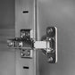 Detail of a stainless steel hinge on premium outdoor kitchen cabinets with a sleek, durable finish.