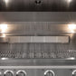Stainless steel gas grill with open lid, illuminated interior, and modern cabinets for premium outdoor kitchens.