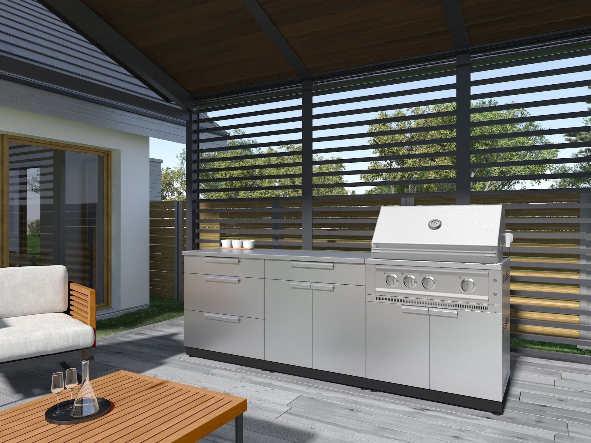 Premium outdoor kitchen with stainless steel grill, modular cabinets, and sink under a covered patio.
