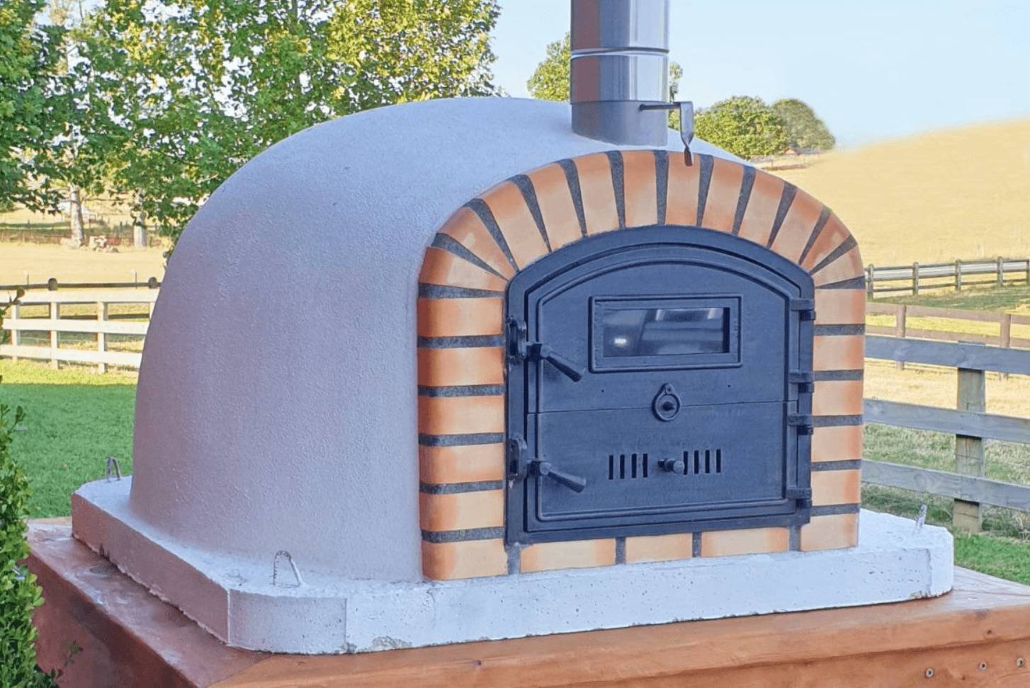 https://outdoorkitchenpro.com/cdn/shop/products/authentic-pizza-ovens-pizza-ovens-authentic-pizza-ovens-lisboa-premium-wood-fired-pizza-oven-handmade-brick-bake-roast-rotisserie-lisprem-38541736935665_2048x.png?v=1680032934