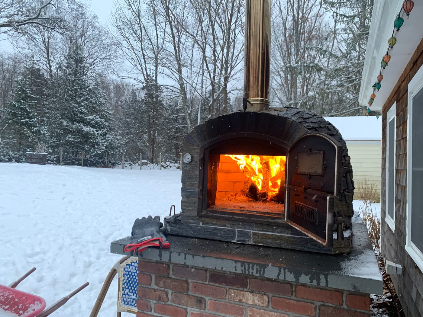 https://outdoorkitchenpro.com/cdn/shop/products/authentic-pizza-ovens-pizza-ovens-authentic-pizza-ovens-lisboa-stone-finish-premium-wood-fired-pizza-oven-handmade-brick-bake-roast-rotisserie-lisstnprem-38542973862129_2048x.jpg?v=1679131011