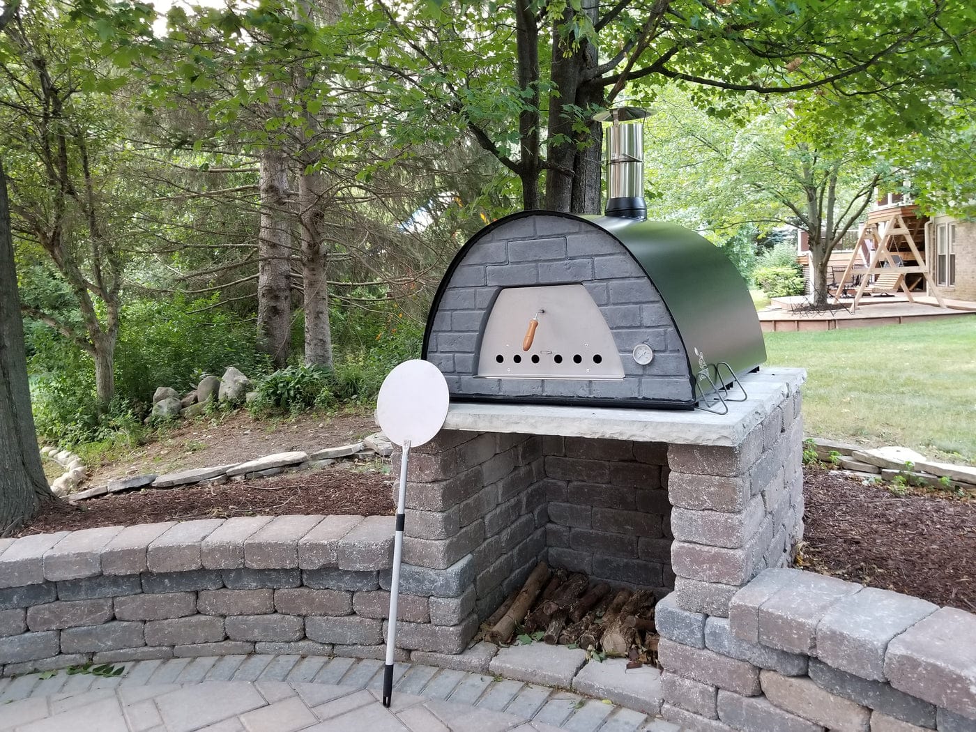 https://outdoorkitchenpro.com/cdn/shop/products/authentic-pizza-ovens-pizza-ovens-authentic-pizza-ovens-maximus-prime-large-black-portable-wood-fired-pizza-oven-primeb-38549374730481_2048x.jpg?v=1680555715